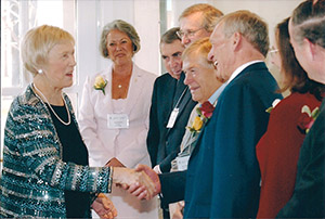 Lieutenant Governor Hole congratulates recipients at a May 2003 Kilam Prize ceremony in Edmonton.
